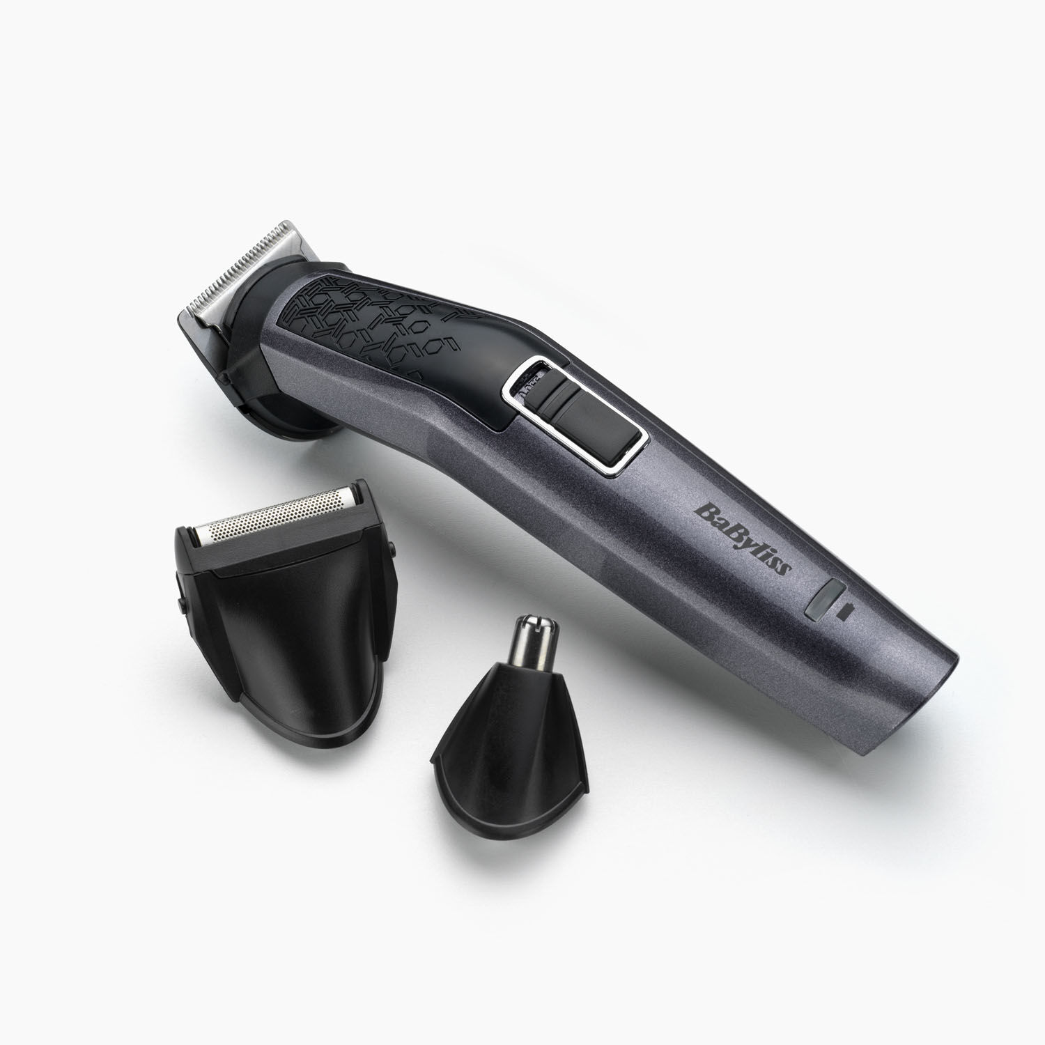 Carbon Titanium Multi-Trimmer with precision trimmer on.  FOil shaver and ear/nose trimmer are next to it
